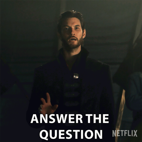 A Man In A Black Coat Says Answer The Question Netflix GIF