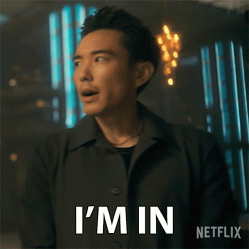 A Man In A Black Coat Says I 'M In Netflix GIF