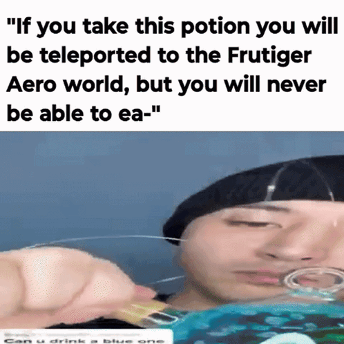 A Man In A Black Hat Is Drinking A Blue Liquid From A Glass .. GIF
