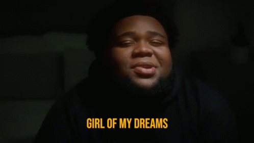 A Man In A Black Hoodie Says Girl Of My Dreams In Yellow Letters GIF
