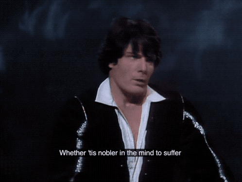 A Man In A Black Jacket And White Shirt Has The Word Grunting Above Him GIF