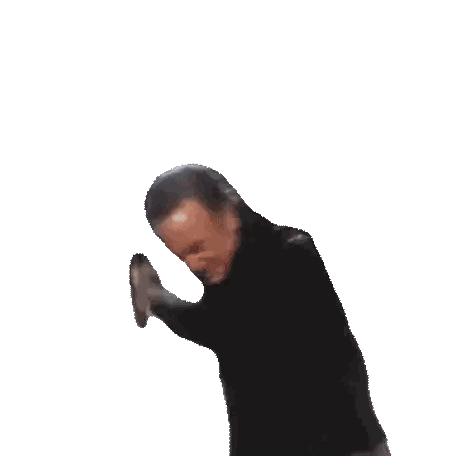 a man in a black jacket is dancing with his hand up