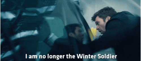 A Man In A Black Jacket Is Standing Next To A Car With The Words I Am No Longer The Winter Soldier Above Him GIF