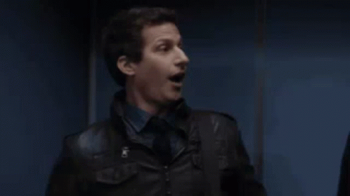 A Man In A Black Jacket Is Surrounded By The Words Cool GIF