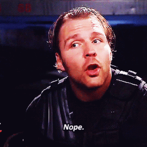 A Man In A Black Jacket Says Nope In White Letters GIF