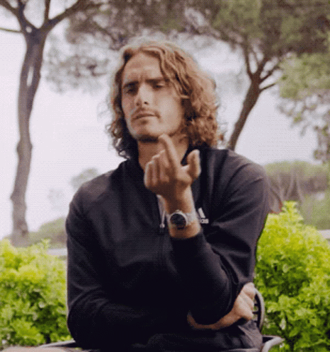 A Man In A Black Jacket With The Word Adidas On His Watch GIF