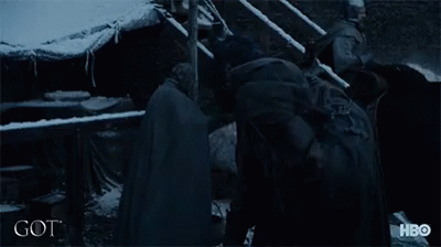 A Man In A Black Jacket With The Word Got On The Bottom Right GIF
