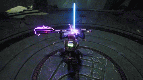 A Man In A Black Jacket With The Word Lucas On The Back Is Holding A Lightsaber GIF