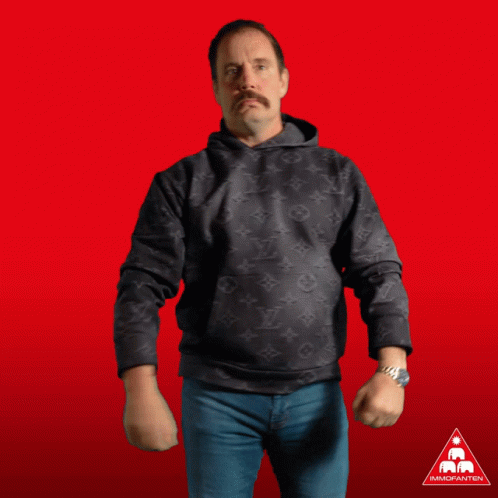 A Man In A Black Louis Vuitton Hoodie Is Dancing GIF