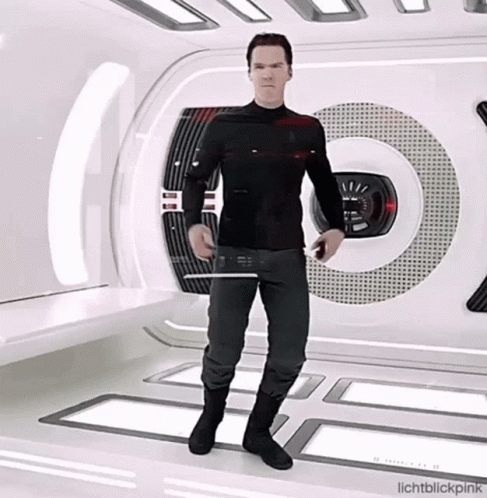 A Man In A Black Shirt And Black Pants Is Dancing In A Room With The Words Lichtblickpink Written On The Bottom GIF