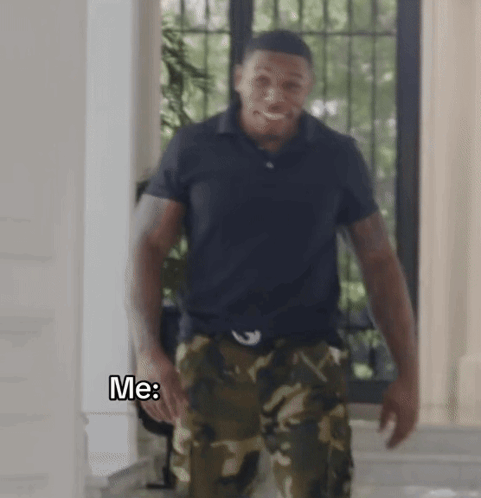 Man In Black Shirt And Camo Pants Saying Me GIF
