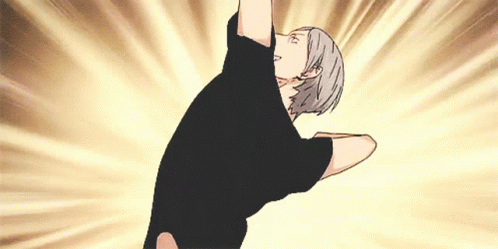 A Man In A Black Shirt Is Doing A Handstand GIF