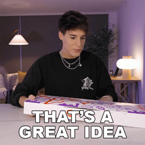 A Man In A Black Shirt Is Holding A Box That Says " That 'S A Great Idea " GIF