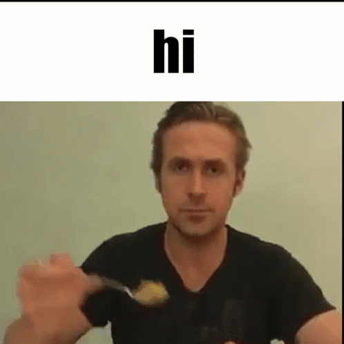 A Man In A Black Shirt Is Holding A Spoon In His Hand And Saying Hi . GIF