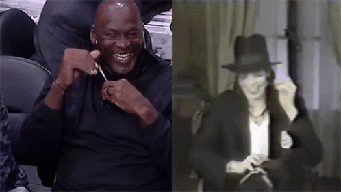 A Man In A Black Shirt Is Laughing Next To A Picture Of Michael Jackson . GIF