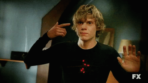 A Man In A Black Shirt Is Pointing At Himself And The Fx Logo Is Visible GIF