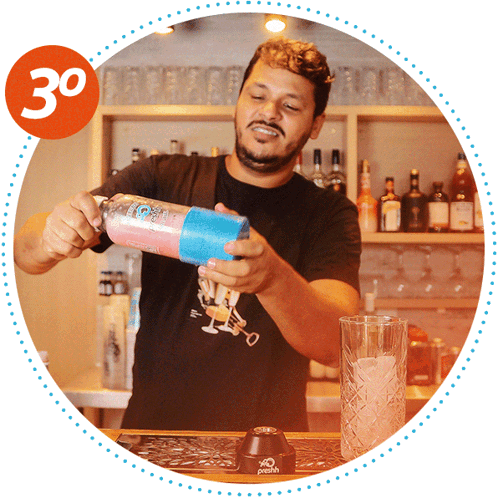 a man in a black shirt is pouring a drink into a glass with a 30 circle around him