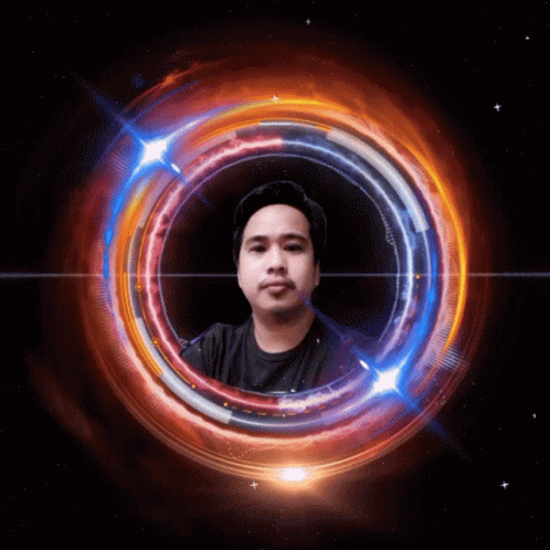 a man in a black shirt is surrounded by a glowing circle