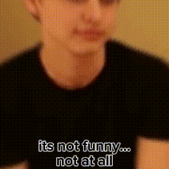 A Man In A Black Shirt Is Talking About Being Funny . GIF