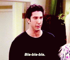 a man in a black shirt is talking to a woman and says bla-bla-bla