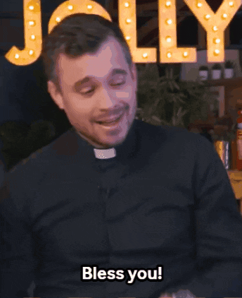 A Man In A Black Shirt Says Bless You GIF