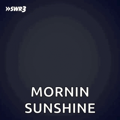 A Man In A Black Shirt Says Mornin Sunshine With His Hands On His Hips GIF
