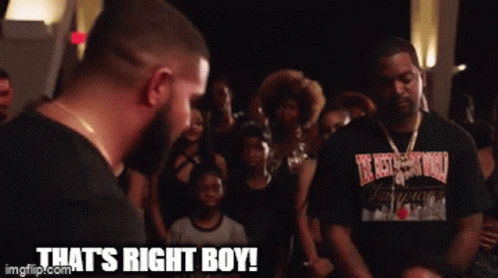 A Man In A Black Shirt Says That 'S Right Boy In Front Of A Crowd Of People GIF