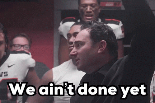 A Man In A Black Shirt Says " We Ain 'T Done Yet " GIF