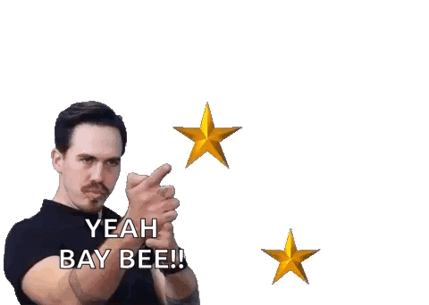 A Man In A Black Shirt Says Yeah Bay Bee In Front Of Two Gold Stars GIF