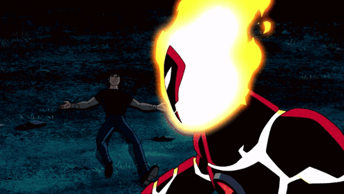 A Man In A Black Shirt Stands In Front Of A Cartoon Character With A Fire Head GIF