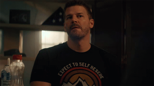 A Man In A Black Shirt That Says Respect To Self Rescue GIF