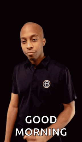 A Man In A Black Shirt With The Letter B On It Says Good Morning GIF