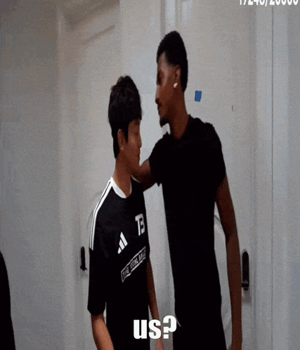A Man In A Black Shirt With The Letter Tb On It GIF