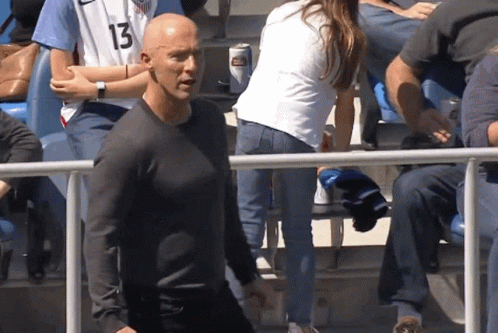 A Man In A Black Shirt With The Number 13 On His Shirt GIF