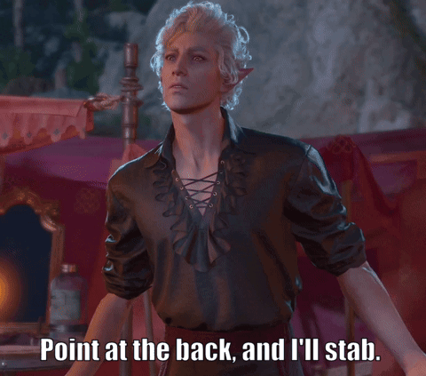 A Man In A Black Shirt With The Words Point At The Back And I 'Ll Stab Above Him GIF