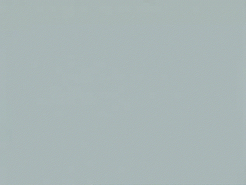 A Man In A Black Suit Stands In Front Of A White Background GIF