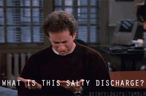 A Man In A Black Sweater Is Asking What Is This Salty Discharge GIF