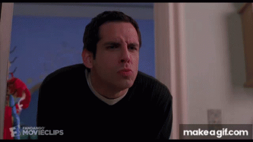 A Man In A Black Sweater Is Making A Funny Face In A Scene From A Movie GIF