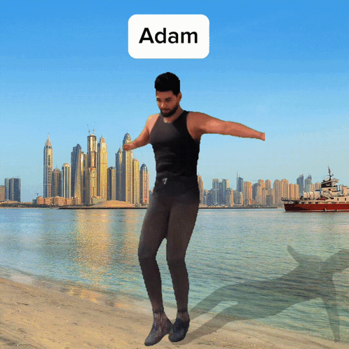 A Man In A Black Tank Top Is Jumping In The Air With The Word Adam Above Him GIF