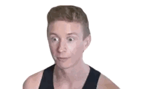 a man in a black tank top is looking at the camera .
