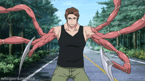 A Man In A Black Tank Top Is Standing In The Middle Of A Road With Red Tentacles Coming Out Of His Arms GIF
