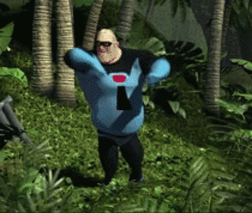 A Man In A Blue And Black Superhero Costume Is Standing In The Jungle GIF