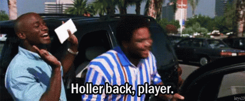 A Man In A Blue And White Striped Shirt Is Holding A Card That Says Hollerback Player GIF