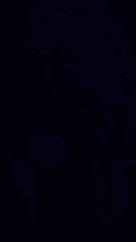 A Man In A Blue Chelsea Jersey Is Holding A Soccer Ball . GIF