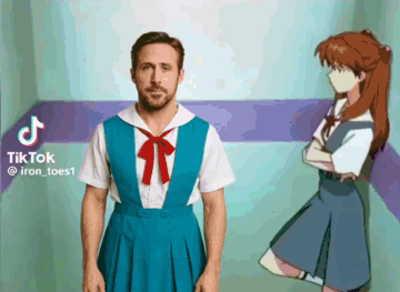 A Man In A Blue Dress Is Standing Next To A Girl In A Blue Dress GIF