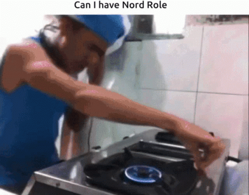 A Man In A Blue Hat Is Cooking On A Stove With The Caption " Can I Have Nord Role " GIF