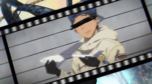 A Man In A Blue Hat Is Holding A Piece Of Paper In His Hand GIF