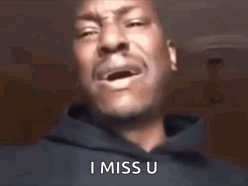 A Man In A Blue Hoodie Is Crying And Saying I Miss U . GIF