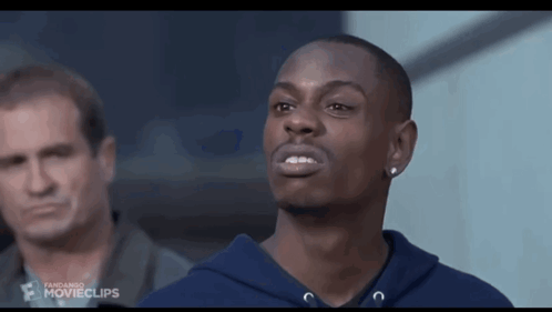 A Man In A Blue Hoodie Is Standing In Front Of A Man In A Grey Shirt With Movieclips Written On The Bottom GIF