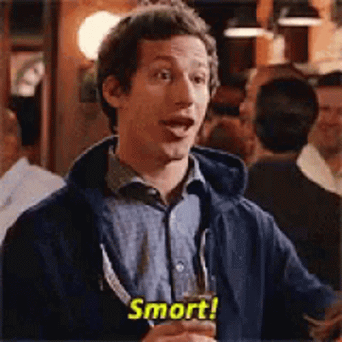A Man In A Blue Jacket Is Holding A Glass Of Beer And Saying Smrt . GIF